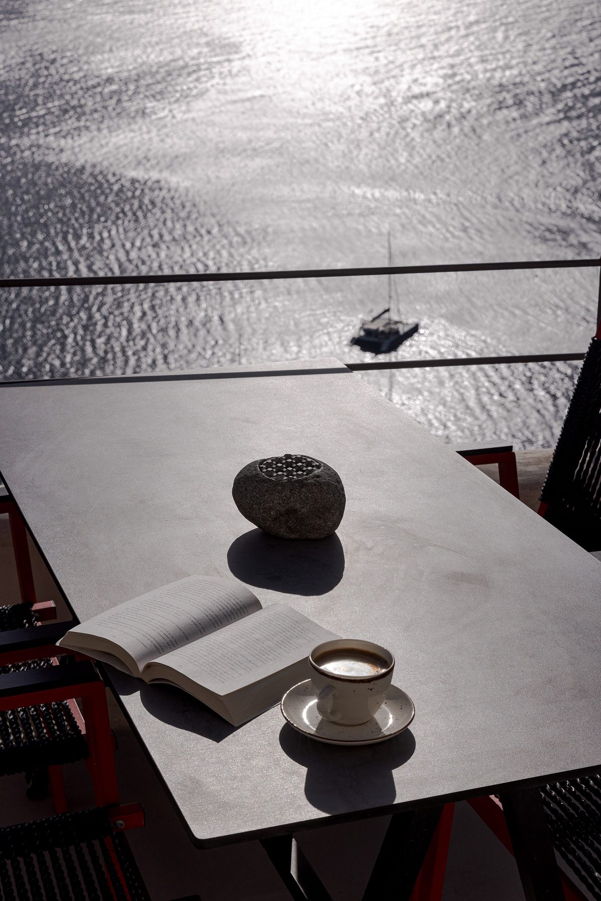 Morning coffee overlooking Santorini caldera - the guest experience THIREON delivers